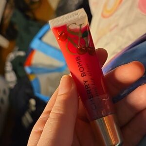 Brand new Victoria's secret lip gloss in cherry bomb